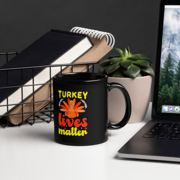 black-glossy-mug-black-11-oz-handle-on-right-68f3f6a82f818.jpg